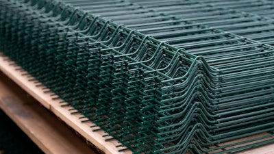 Wire mesh paneling production.