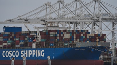 The 'Cosco Shipping France' container ship is moored at the Long Beach Container Terminal, LBCT, at Middle Harbor in the Port of Long Beach, Calif., , April 15, 2025.