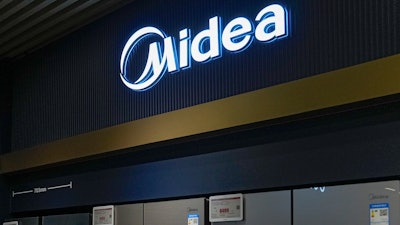 Midea's fridges are seen at an electronic shop in Beijing on Nov. 15, 2021.