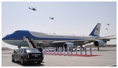 Qatar Air Force Apache gunships perform a flyover as Air Force One is ready to depart from Al Udeid Air Base, Thursday, May 15, 2025, in Doha, Qatar.