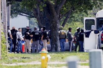 Federal agents are seen near Glenn Valley Foods in Omaha, Neb., June 10, 2025.