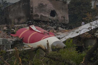 Parts of an Air India plane that crashed on Thursday are seen on top of a building in Ahmedabad, India, Friday, June 13, 2025.