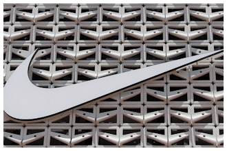 The Nike logo is shown on a store in Miami Beach, Fla. on Aug. 8, 2017.