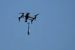 A drone carries a mortar shell as soldiers take part in the U.S.-led Immediate Response 25 military exercise in Petrochori, Greece, Wednesday, June 4, 2025.
