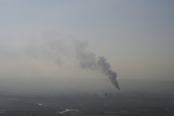 Smoke billows after an Iranian missile struck an oil refinery in Haifa, northern Israel, early Monday, June 16, 2025.