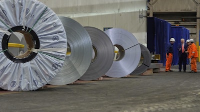 President Donald Trump talks to workers as he tours U.S. Steel Corporation's Mon Valley Works-Irvin plant, Friday, May 30, 2025, in West Mifflin, Pa.