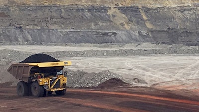 A dump truck hauls coal at Contura Energy's Eagle Butte Mine near Gillette, Wyo., March 28, 2017.