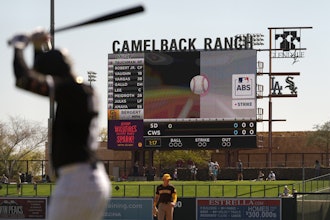 The Automated Ball-Strike System plays on the scoreboard after a pitch call was challenged during the first inning of a spring training baseball game between the Chicago White Sox and the San Diego Padres, Feb. 26, 2025, in Phoenix.