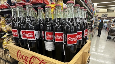 Bottles of Mexican Coca-Cola are displayed at a grocery store in Mount Prospect, Ill., July 17, 2025.