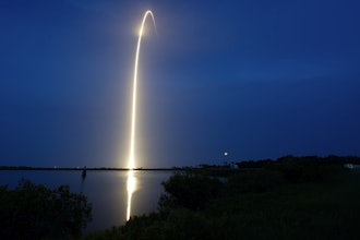 In this long exposure photo, a SpaceX Falcon 9 rocket with a payload of Starlink V2 Mini internet satellites lifts off from Launch Complex 40 at the Cape Canaveral Space Force Station in Cape Canaveral, Fla., late Sunday, July 23, 2023.