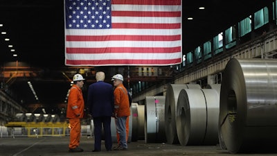 President Donald Trump talks to workers as he tours U.S. Steel Corporation's Mon Valley Works-Irvin plant, Friday, May 30, 2025, in West Mifflin, Pa.