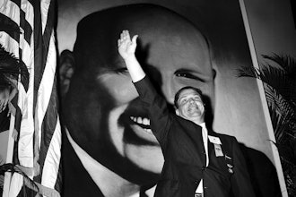 In this Sept. 30, 1957, file photo Jimmy Hoffa, Teamsters vice president and leading candidate to succeed Dave Beck as the IBT's new president, waves to delegates at the opening of the Teamsters Union convention at Miami Beach, Fla.