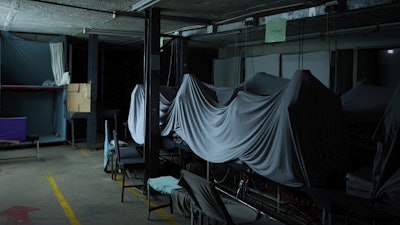 Machines are covered with sheets inside the empty Tzicc clothing factory following the threat of U.S.-imposed tariffs in Maseru, Lesotho, Tuesday, July 22, 2025.