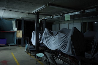 Machines are covered with sheets inside the empty Tzicc clothing factory following the threat of U.S.-imposed tariffs in Maseru, Lesotho, Tuesday, July 22, 2025.