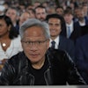 Nvidia CEO Jensen Huang arrives before President Donald Trump speaks during an AI summit at the Andrew W. Mellon Auditorium, Wednesday, July 23, 2025, in Washington.