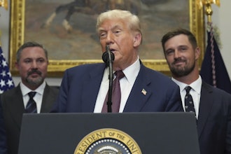 President Trump speaks alongside Cody Campbell, left, and professional golfer Bryson DeChambeau in the Roosevelt Room of the White House, July 31, 2025.