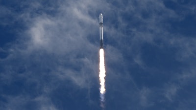 A SpaceX Falcon 9 rocket, carrying a Dragon capsule with a U.S.-Japanese-Russian crew of four, lifts off from Kennedy Space Center's Launch Pad 39-A in Cape Canaveral , Fla., on Friday, Aug. 1, 2025.