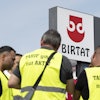 Strikers stand in front of the Birtat factory in Murr, Germany, Wednesday, Aug. 6, 2025.
