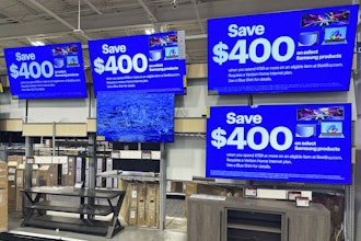 Flat screen TVs displayed at a retail store in Vernon Hills, Ill., Aug. 7, 2025.