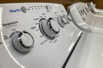 A General Electric washer sits inside a retailer, Sept. 15, 2023, in Marietta, Ga.