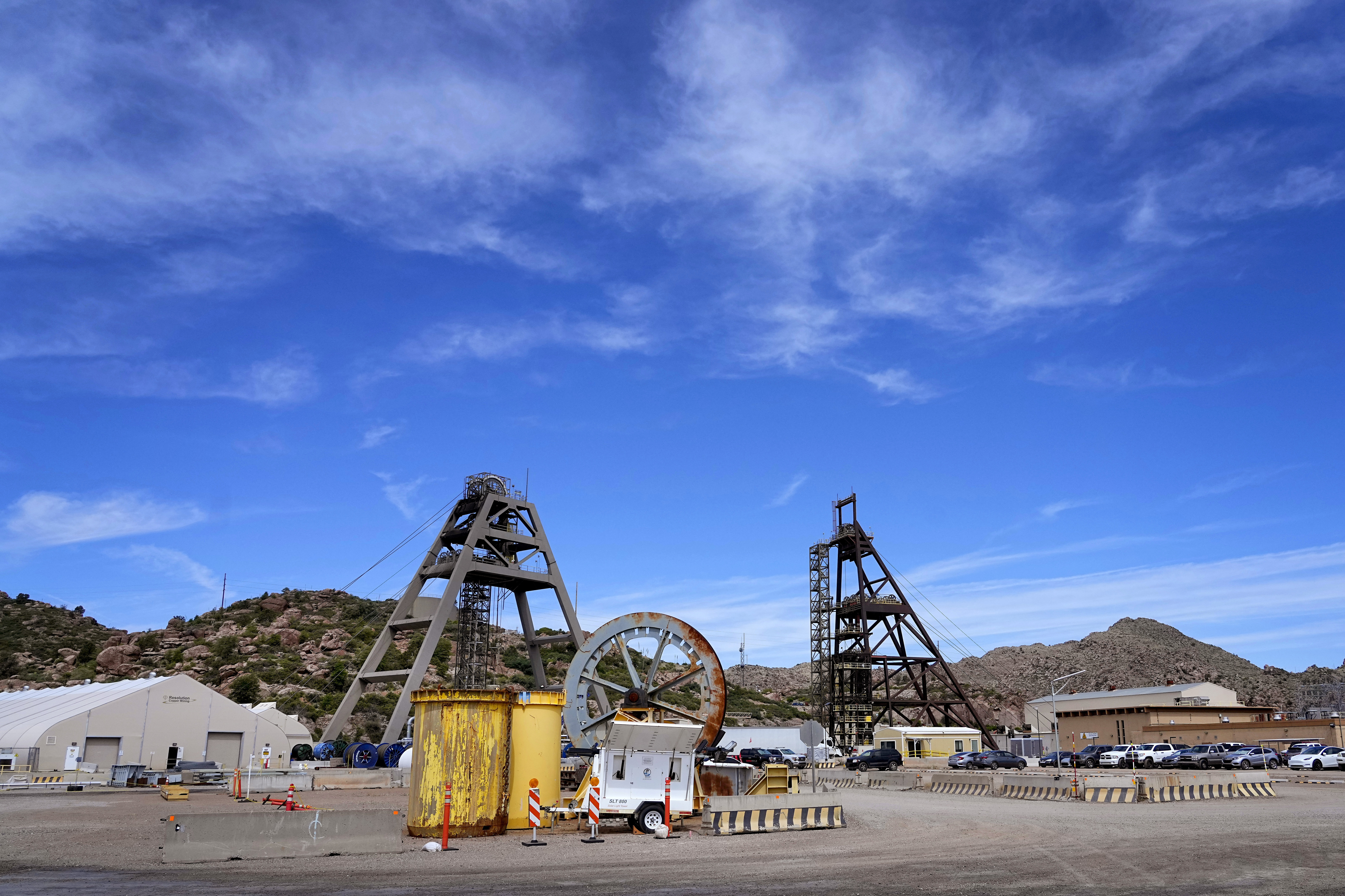 Mine shafts 10, left, and 9, right, tower over the Resolution Copper Mining Company facility, June 9, 2023, in Miami, Ariz.