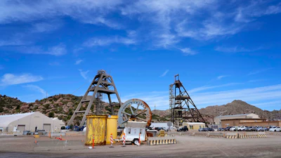 Mine shafts 10, left, and 9, right, tower over the Resolution Copper Mining Company facility, June 9, 2023, in Miami, Ariz.