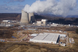 A data center owned by Amazon Web Services, front right, is under construction next to the Susquehanna nuclear power plant in Berwick, Pa., on Jan. 14, 2025.