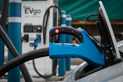 In this photo provided by VTDigger, an electric vehicle is seen plugged into a fast charger in Rutland, Vt., Feb. 17, 2022.