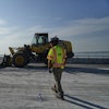 A demolition crew removes a slab of concrete from the remaining portions of the Francis Scott Key Bridge, Wednesday, July 30, 2025, in Baltimore.