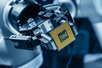 Robot Arm Holding Contemporary Super Computer Processor.