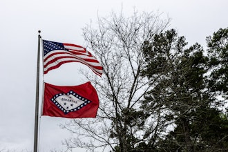 USA and Arkansas flags outside Lake Catherine State Park Headquarters.