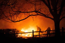 Residents fight the Marshall Fire in Louisville, Colo., Dec. 30, 2021.