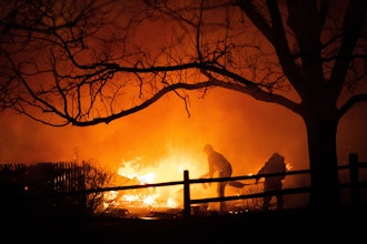 Residents fight the Marshall Fire in Louisville, Colo., Dec. 30, 2021.