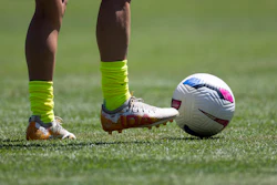 Washington Spirit midfielder Courtney Brown warms up with cleats that read 'IDA' before a NWSL soccer match against Bay FC on Saturday, Aug. 23, 2025, in San Francisco.