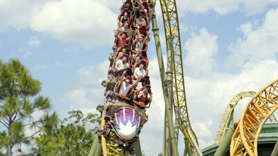 Guests ride on the Stardust Racers roller coaster at Epic Universe Theme Park at Universal Resort Orlando, April 10, 2025, in Orlando, Fla.