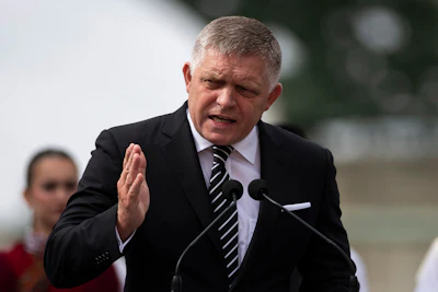 Slovakia's Prime Minister Robert Fico delivers his speech during the 130th anniversary celebration of Mária Valeria Bridge in Esztergom, Hungary, on Sunday, Sept. 28, 2025.