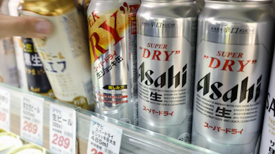 Cans of beer sit on a shelf at a supermarket in Yokohama, near Tokyo Friday, Oct. 3, 2025.
