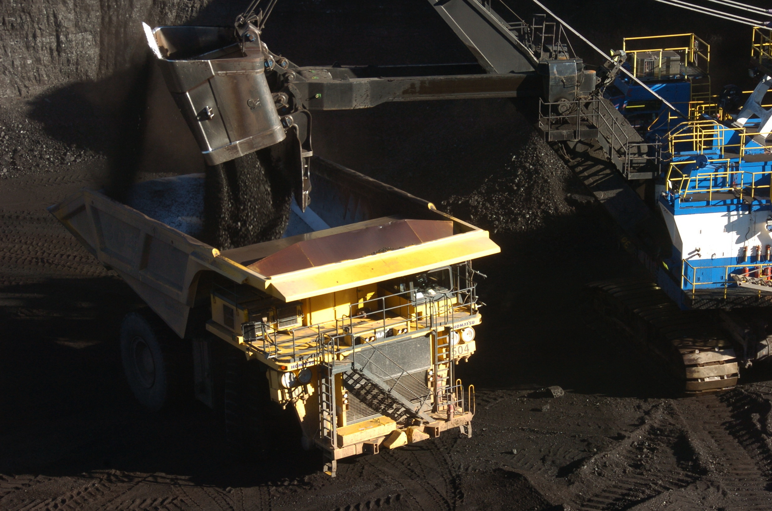 A mechanized shovel loads coal into a haul truck at the Spring Creek mine, in this Nov. 15, 2016 photo, near Decker, Mont.