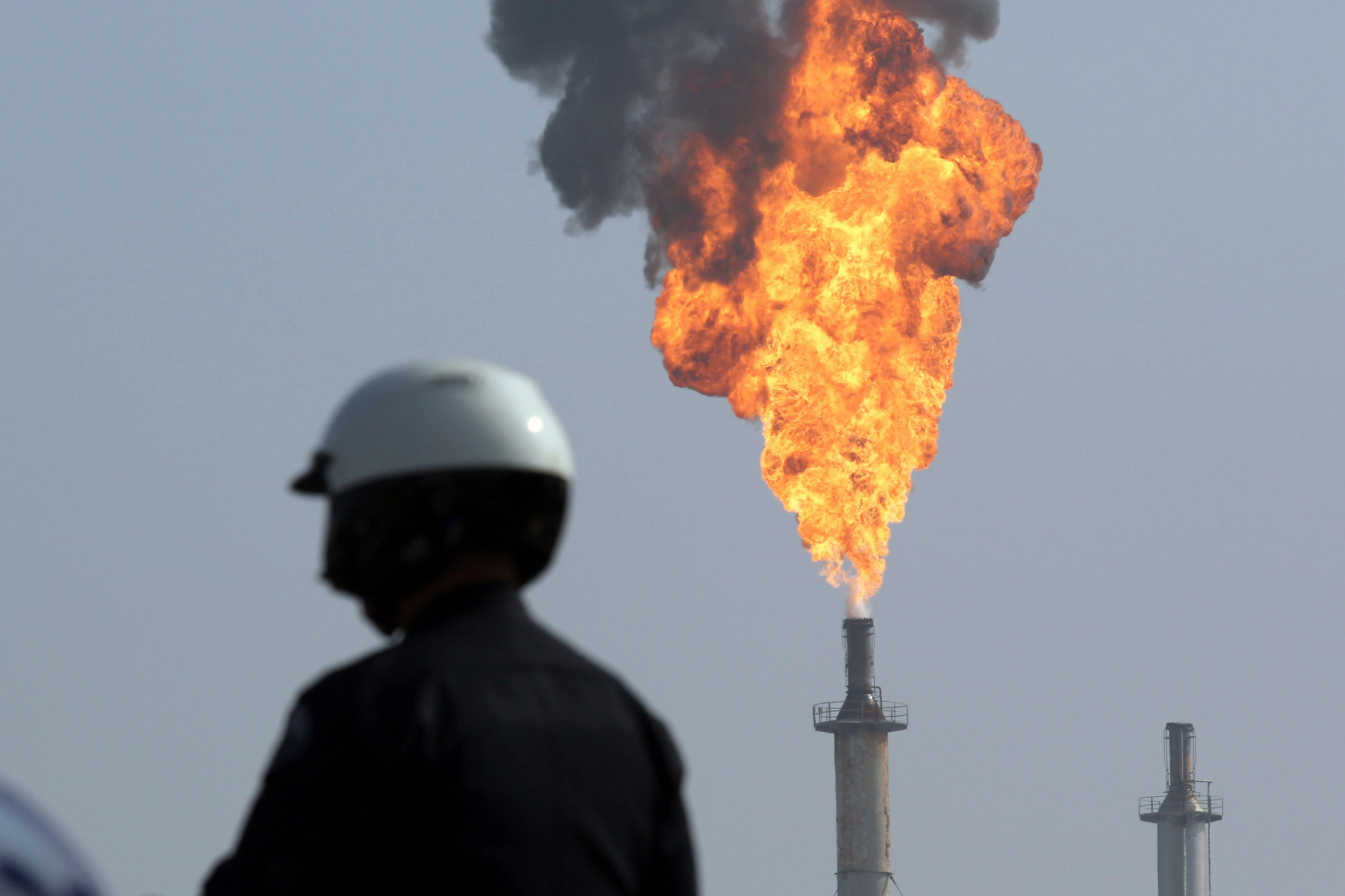 A very large smokestack flare burns off flammable product after an explosion in a processing facility at the ExxonMobil refinery in Torrance, Calif., on Feb. 18, 2015.