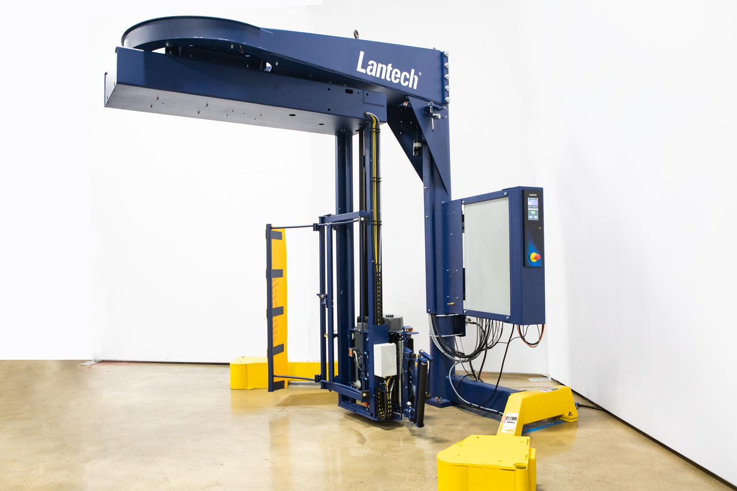 Lantech industrial packaging machine with blue frame and control panel