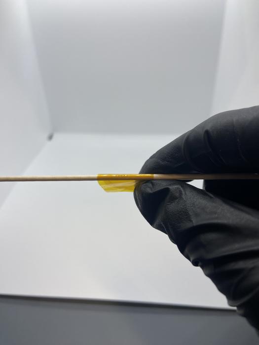 A fully printed carbon nanotube thin-film transistor with an ion gel gate printed on top of flexible Kapton, capable of bending around a rod with a two-millimeter diameter. Kapton is commonly used in a variety of demanding applications such as flexible printed circuits and high-temperature electronics.