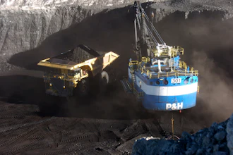 A haul truck is seen after being loaded with coal by a mechanized shovel at the Spring Creek mine, in this Nov. 15, 2016 photo, near Decker, Mont.
