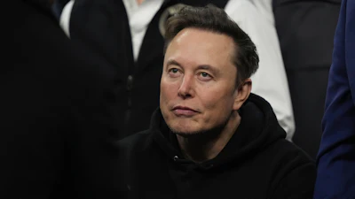 Elon Musk attends the finals for the NCAA wrestling championship, Saturday, March 22, 2025, in Philadelphia.