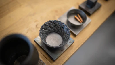 Wire-arc additive manufacturing processes can make large parts, but sometimes they aren't printed perfectly, like the dish in the center. Rao's lab works on monitoring the process and taking corrective action to ensure parts are printed correctly the first time.