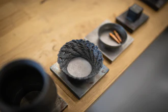 Wire-arc additive manufacturing processes can make large parts, but sometimes they aren't printed perfectly, like the dish in the center. Rao's lab works on monitoring the process and taking corrective action to ensure parts are printed correctly the first time.
