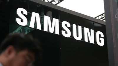 A logo of Samsung Electronics is seen at an exhibition hall for the Asia-Pacific Economic Cooperation (APEC) in Gyeongju, South Korea, Thursday, Oct. 30, 2025.