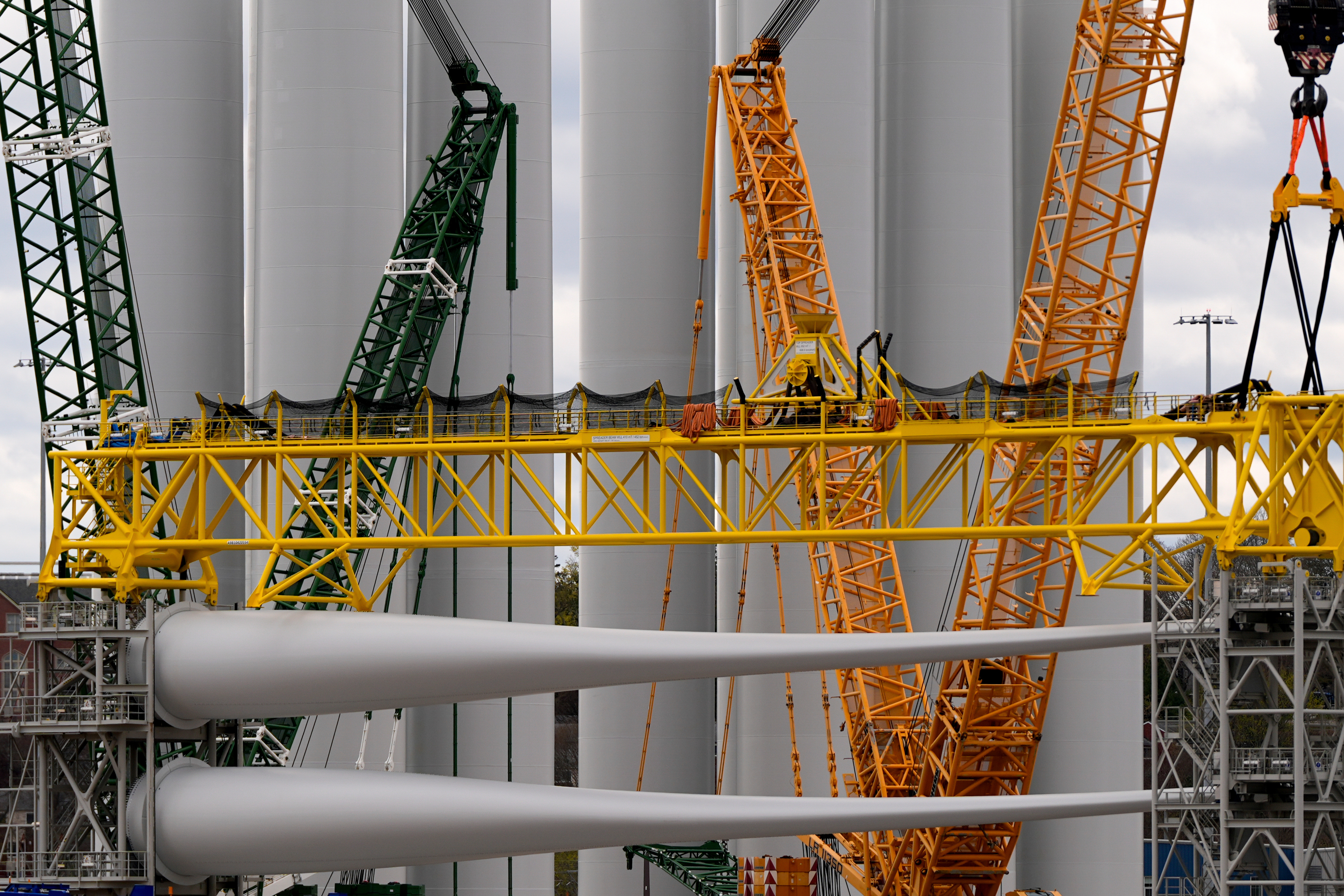 Wind turbine components sit at New London State Pier, April 16, 2025, in New London, Conn.