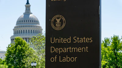 In this May 7, 2020, file photo, the entrance to the Labor Department is seen near the Capitol in Washington.