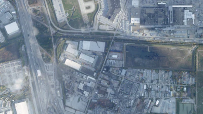 This satellite image from Planet Labs PBC shows the crash site of a UPS McDonnell Douglas MD-11 aircraft just south of Muhammad Ali International Airport, in Louisville, Ky., Monday, Nov. 10, 2025.