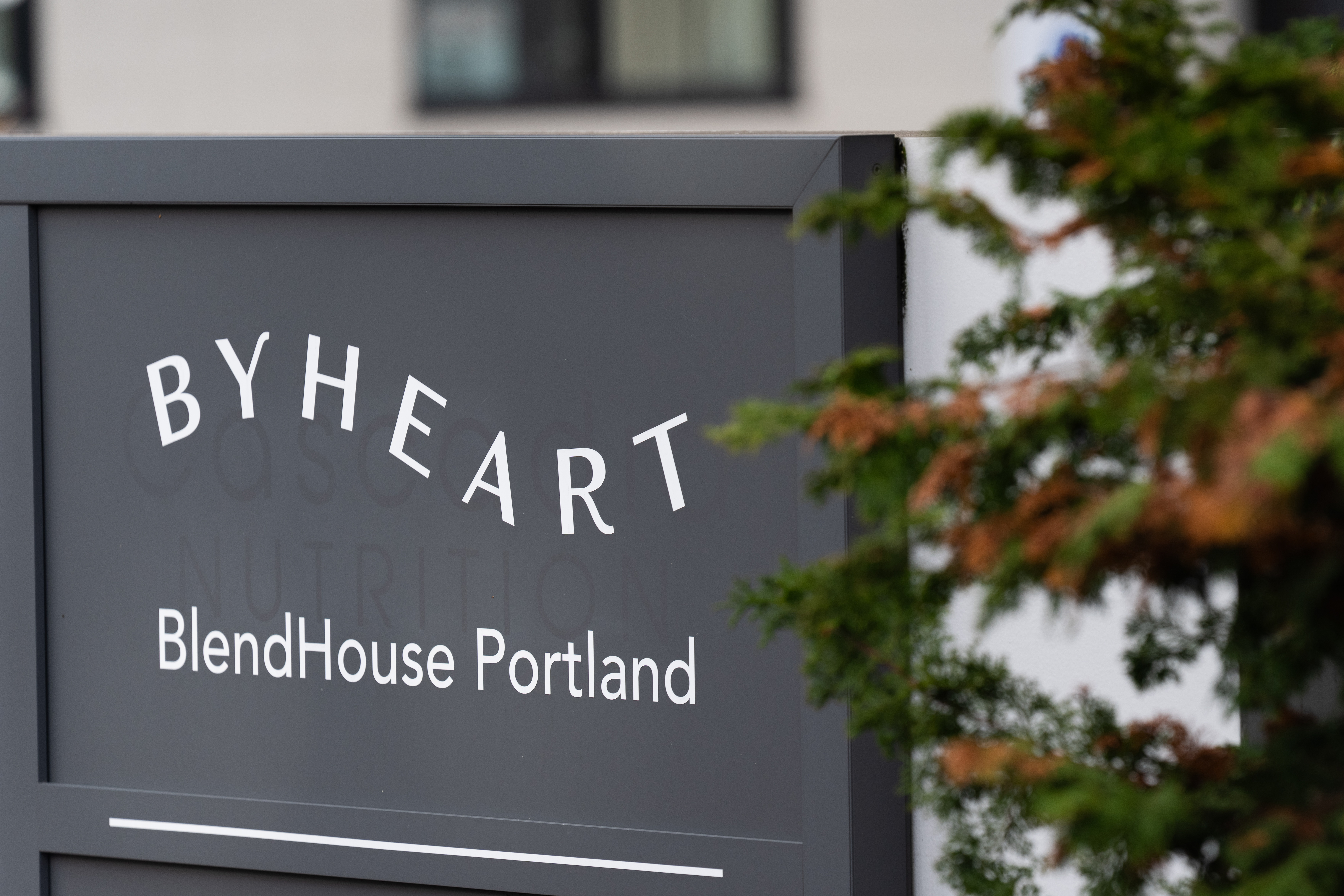 A sign for ByHeart, a manufacturer of organic baby formula, is displayed outside a building that houses a plant for the company on Tuesday, Nov. 11, 2025, in Portland, Ore.